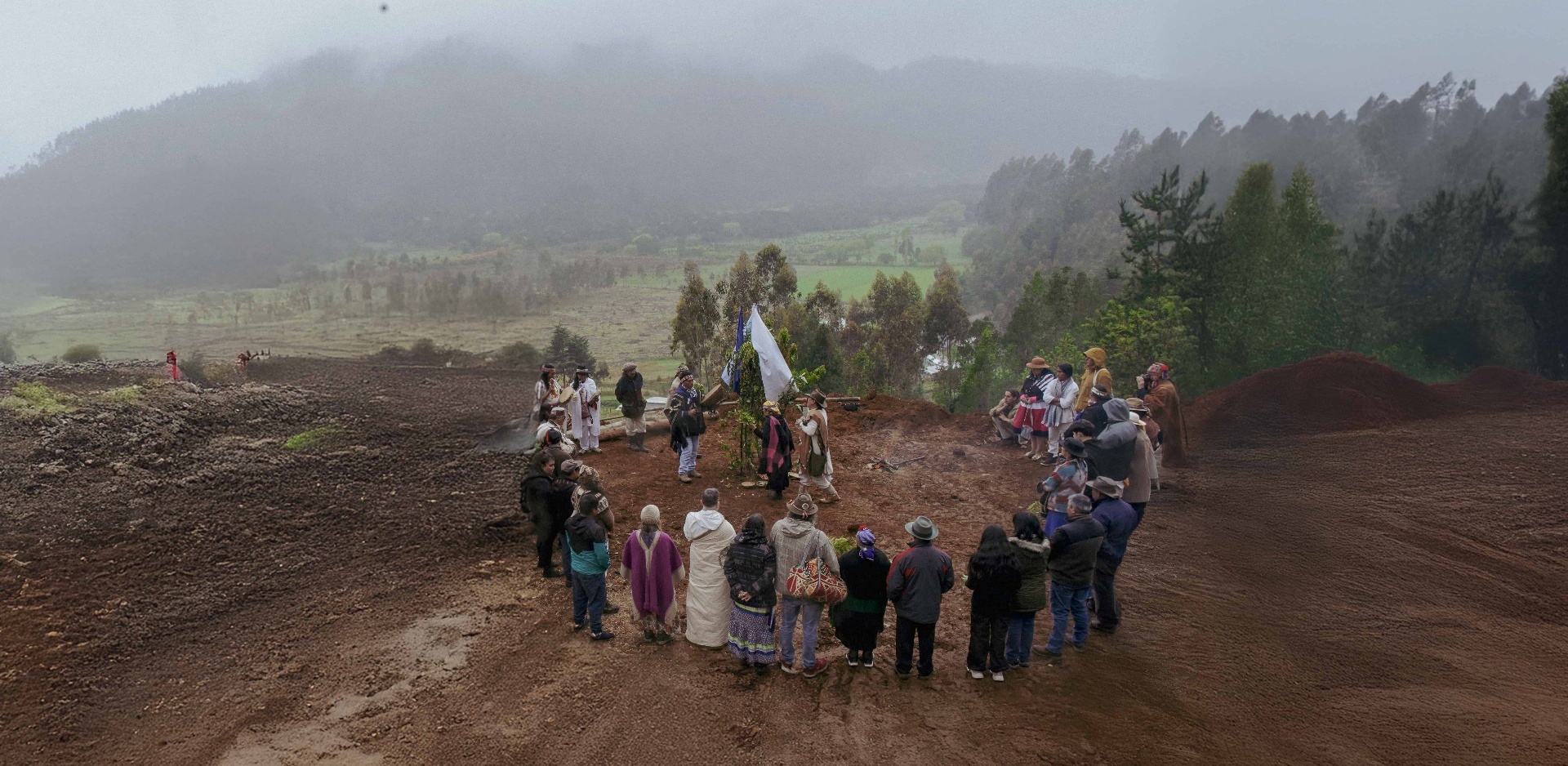 Earth Elders gathered in ceremonial circle